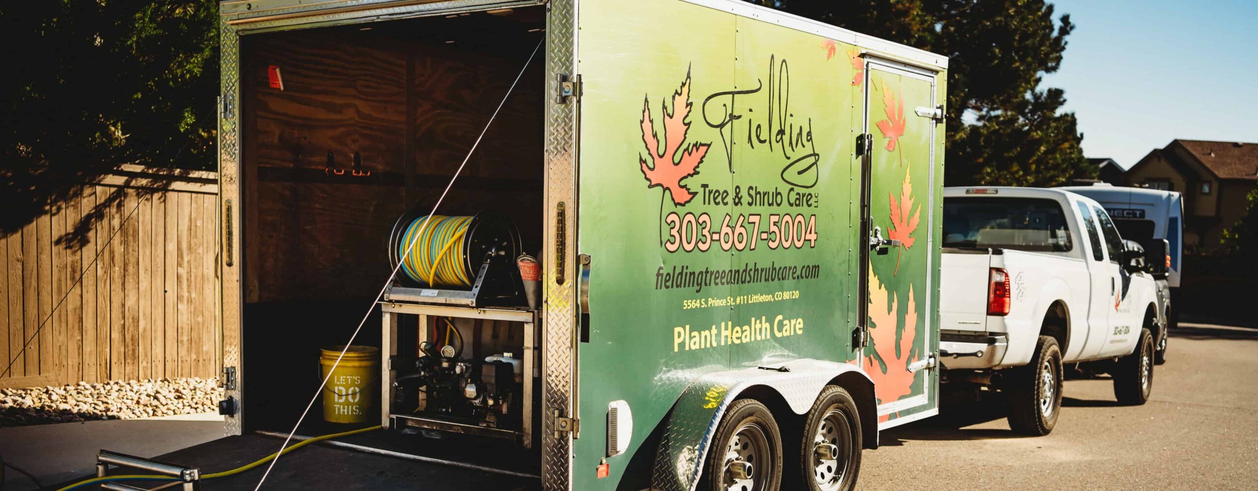 A Fielding Tree Care truck with tree fertilization tools.